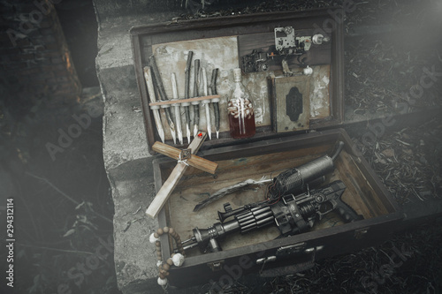Fotografía A set of things hunter evil spirits, demons, vampires in an old suitcase
