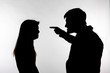 © satura_ - Aggression and abuse concept - man and woman expressing domestic violence in studio silhouette isolated on white background.