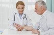 © Freepik - Doctor examining hand of patient
