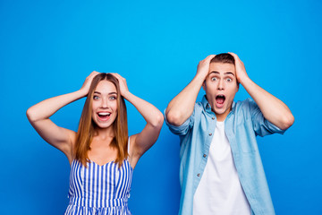 Portrait of his he her she two nice attractive charming lovely cheerful cheery people showing omg expression isolated over bright vivid shine vibrant blue turquoise color background