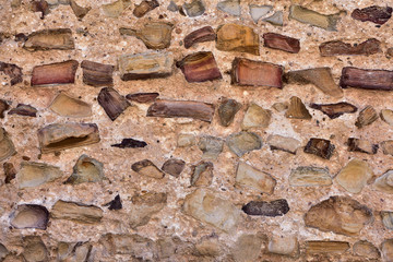 antique masonry from the stones of the dilapidated walls of buildings