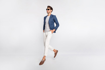 Poster - Full length body size view of his he nice attractive lovely cheerful cheery business tourist wearing checked blazer jumping strolling going vacation isolated over light white pastel background