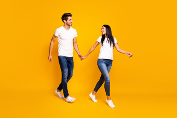 Sticker - Come with me honey. Full body photo of two people walking down street for shopping wear casual clothes isolated yellow color background