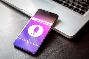 Voice assistant concept on smartphone. Closeup AI mobile phone siri sound recognition application