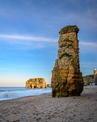 Wall Mural - weathered sea stacks at marsden bay, located near south shields, consisting of a sandy beach enclose