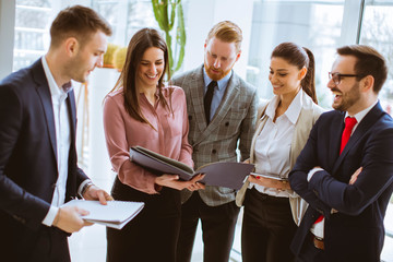 Wall Mural - Group of business people standing in the office