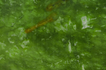 Green natural marble with brown veins in cracks, texture for ceramic tiles and floor tiles