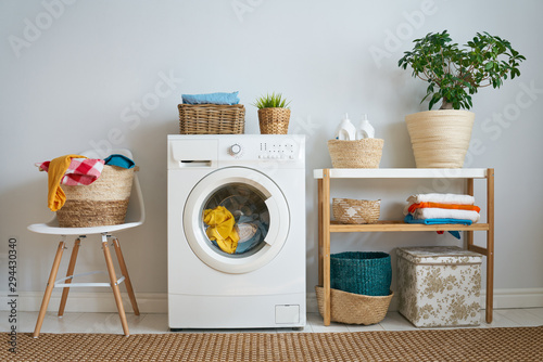 laundry room with a washing machine Poster Mural XXL
