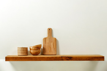 Wall Mural - wooden kitchen shelf of free space for your decoration and gray wall space