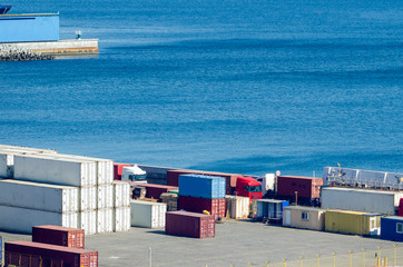 Stacked cargo containers in storage area of freight sea port