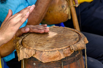 Sticker - Ethnic drums used in religious festival in Lagoa Santa, Minas Gerais near the fire so that the leather stretch and adjust the sound of the instrument