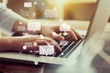 © BillionPhotos.com - Businesswoman at work with laptop,close up