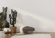 © J.Zhuk - Boho-style interior with leather pouf and cacti
