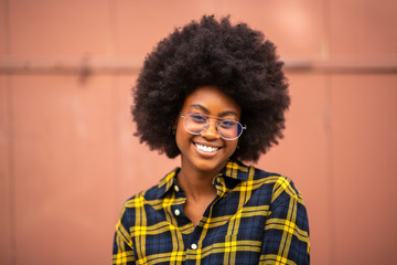 Poster - front portrait of young african american woman with afro and glasses