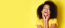 Super Happy Afro-american Girl Isolated On Yellow Background.