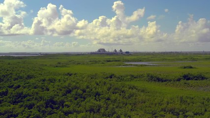 Wall Mural - Turkey Point Nuclear Generating Station shot with aerial drone 4k