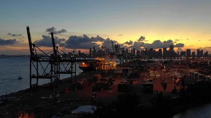 Wall Mural - Twilight aerial video Port of Miami in action containers loading 4k