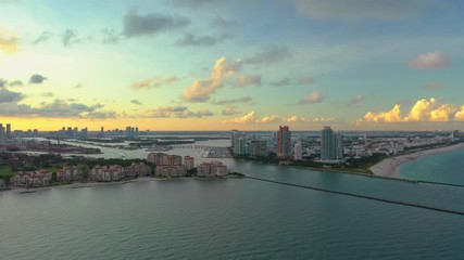 Wall Mural - Establishing aerial shot Miami Beach FL 4k showing inlet highrise condominiums and Fisher Island