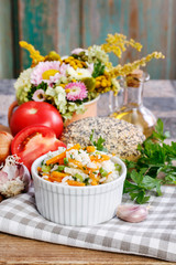 Sticker - Boiled rice with vegetables in a white ribbed bowl.