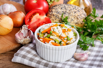 Sticker - Boiled rice with vegetables in a white ribbed bowl.