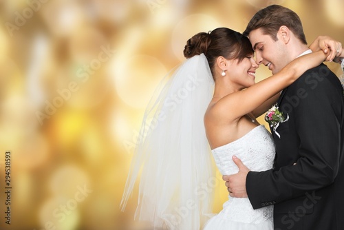Fotomural Happy just married young couple on black background, vintage