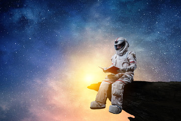 Wall Mural - spaceman and the planet earth abstract theme