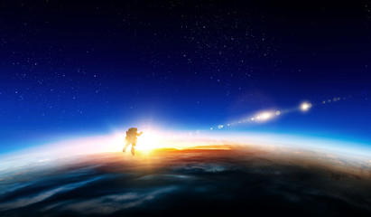 Wall Mural - Spaceman and planet, human in space concept