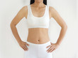© jaojormami - weight loss and slim body in woman and she showing her waistline curve and belly fit and firmming use for workout,fitness or diet and burn or detox and dietary supplement product on white background.