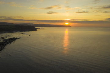  Somerset sunrise aerial view over the coast in the UK