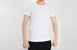 white t-shirt on a young caucasian man isolated. Ready for your design. Man in blank t shirt mock up
