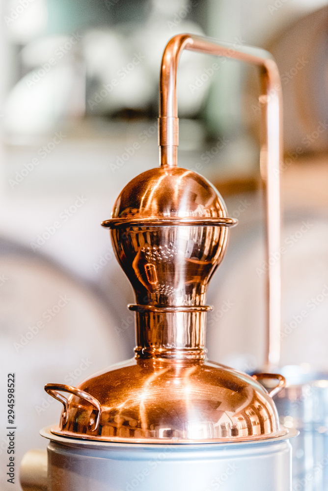 alembic still for making alcohol inside distillery - obrazy, fototapety, plakaty 