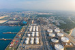© Sunday Stock - Aerial view Of the refinery with an oil depot and a petrochemical storage tank at sea with a shipping port.