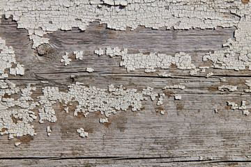 Wooden surface with cracked paint texture