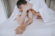 © Irina Polonina/Stocksy - Loving couple of adults lying on the bed