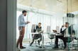 © Lumina/Stocksy - Businessmen Having a Meeting