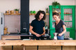 © Bonninstudio/Stocksy - Couple at home.