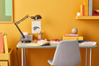 © 365mm/Stocksy - Stylish design of colorful working place