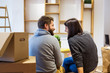 © Aleksandar Novoselski/Stocksy - Young couple moving in a new home