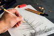 © Gabriel (Gabi) Bucataru/Stocksy - Male Hand Sketching a Spruce tree