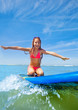 Little surfer girl board have fun on surfboard