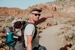 © Cavan Images - A hiker points out the way to go on the mountain, el Teide, Tenerife