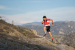 © Cavan Images - Man running up a rocky trail at sunset, el Arenal, hidalgo, Mexico