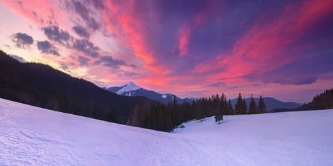 Fabulous winter landscape with colorful sunset