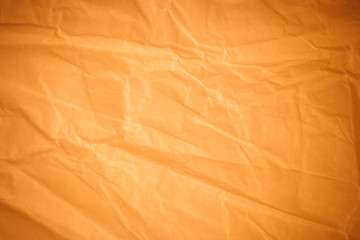 Wall Mural - Brown crumpled paper background.