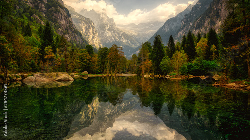 Fotomural lake in the mountains of Mello Valley, autumn season, Italy
