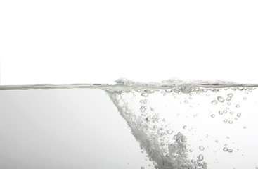 Water splash with bubbles of air, isolated on the white background.