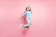 Full length body size side profile photo of cheerful positive cute ecstatic overjoyed girl screaming hooray knowing about sales isolated over pastel color background in jeans denim
