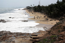 View Of The Beach In Cape Coast, Ghana - In The Foreground Old Rusty Cannons From The Fort Were Thrown Down The Hill Onto The Beach