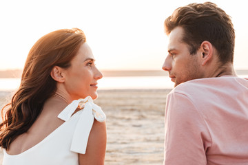 Wall Mural - Lovely young couple wearing summer clothing