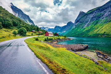 Wall Mural - Colorful summer scene of Hjorundfjorden fjord, Orsta municipality, More og Romsdal county. Colorful morning view of Norway. Traveling concept background.